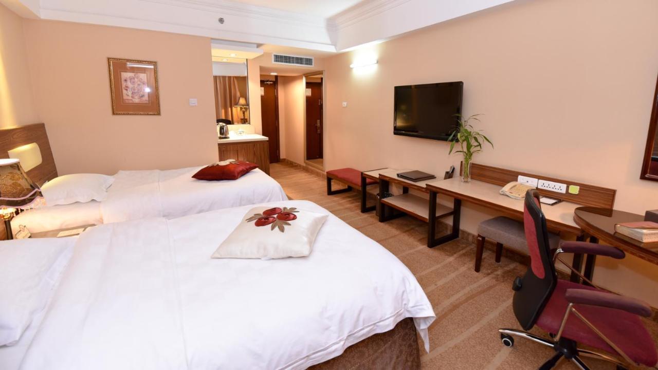 Bremen Holiday Hotel Харбин Экстерьер фото